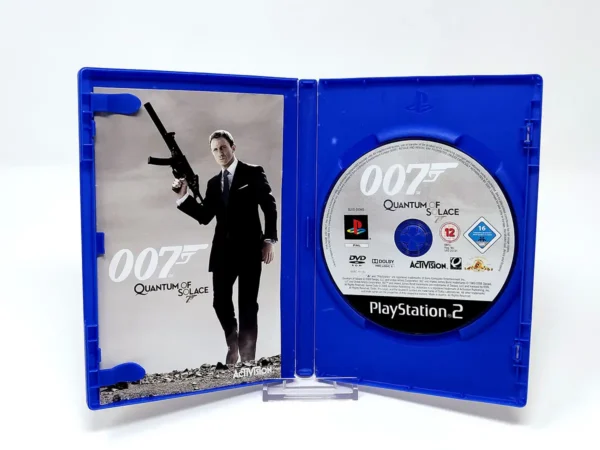 Interior del juego 007: Quantum of Solace (FRA) para PlayStation 2 con disco y manual