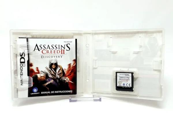 Interior del juego Assassin's Creed II: Discovery (ESP) para Nintendo DS con disco y manual