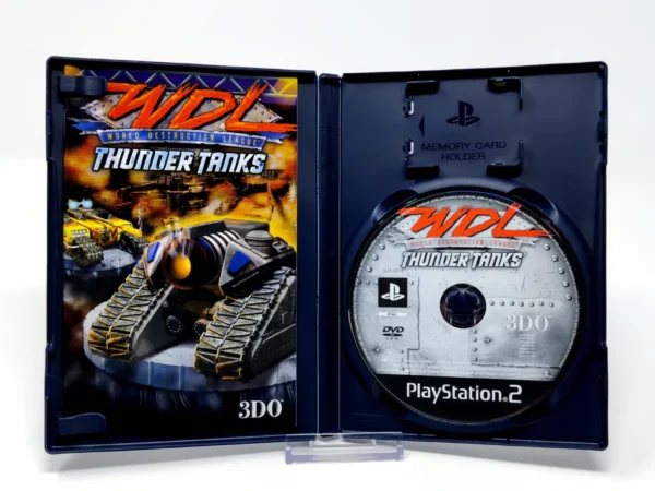 Interior del juego World Destruction League: Thunder Tanks (FRA) para PlayStation 2 con disco y manual