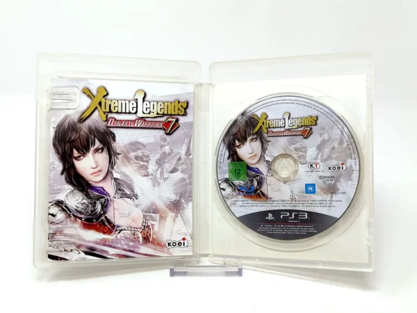 Interior del juego Dynasty Warriors 7: Xtreme Legends (ESP) para PlayStation 3 con disco y manual