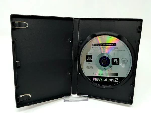 Interior del juego State of Emergency (FRA) (Platinum) para PlayStation 2 con disco y manual