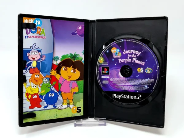 Interior del juego Dora l'Exploratrice: Voyage sur la Planète Violette (FRA) para PlayStation 2 con disco y manual