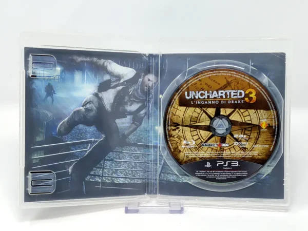 Interior del juego Uncharted 3: L'Inganno Di Drake (ITA) (Rebajado) para PlayStation 3 con disco y manual