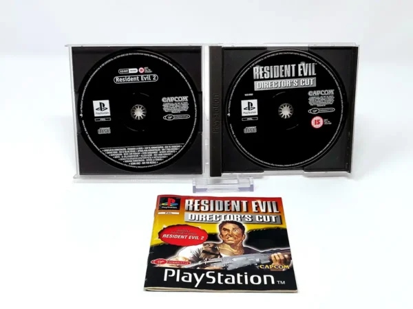 Interior del juego Resident Evil: Director's Cut (UK) para PlayStation 1 con disco y manual