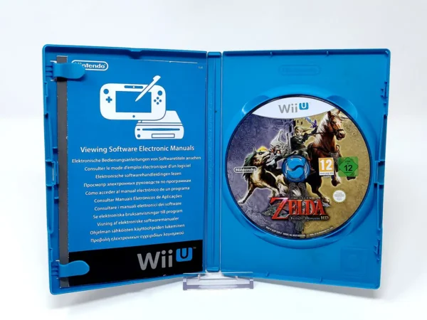 Interior del juego The Legend of Zelda: Twilight Princess HD (ESP) para Nintendo Wii U con disco y manual