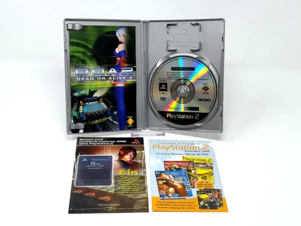 Interior del juego Dead or Alive 2 (ESP) (Platinum) para PlayStation 2 con disco y manual