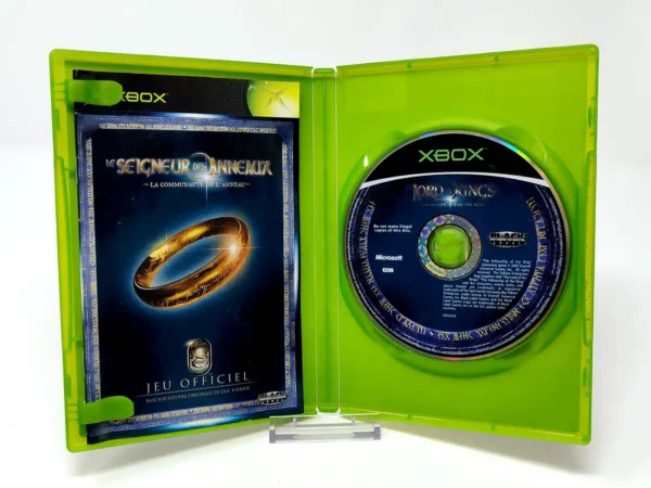 Interior del juego Le Seigneur des anneaux: La communauté de l'anneau (FRA) para XBOX con disco y manual
