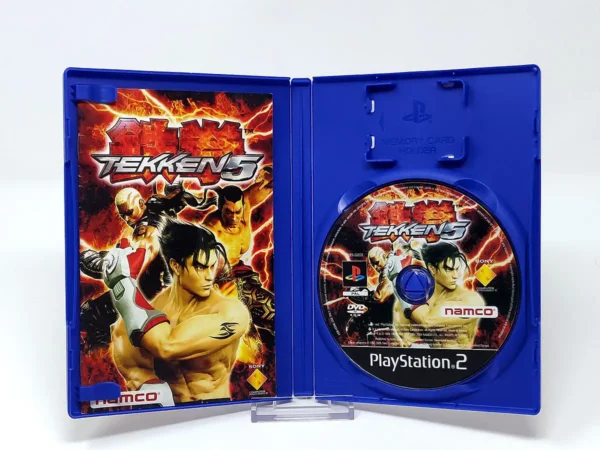 Interior del juego Tekken 5 (ESP) para PlayStation 2 con disco y manual