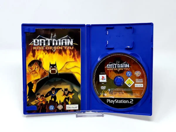 Interior del juego Batman: Rise of Sin Tzu (ESP) para PlayStation 2 con disco y manual