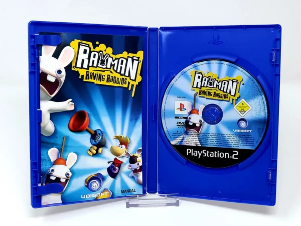 Interior del juego Rayman: Raving Rabbids (ESP) para PlayStation 2 con disco y manual