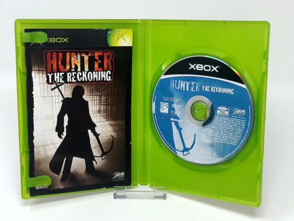 Interior del juego Hunter: The Reckoning (ESP) para XBOX con disco y manual