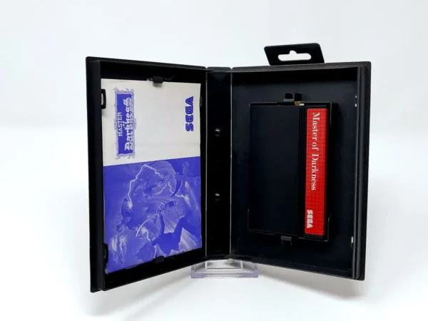 Interior del juego Master of Darkness (ESP) para Sega Master System con disco y manual