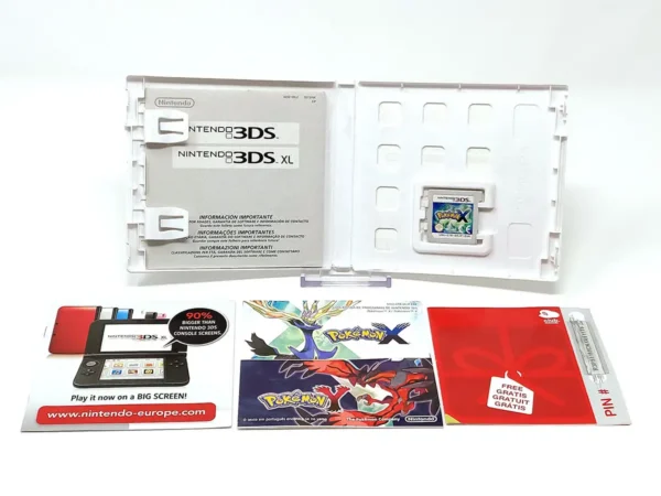 Interior del juego Pokemon X (ESP) para Nintendo 3DS con disco y manual