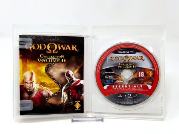 Interior del juego God of War Collection: Volume II (ESP) (Essentials) para PlayStation 3 con disco y manual