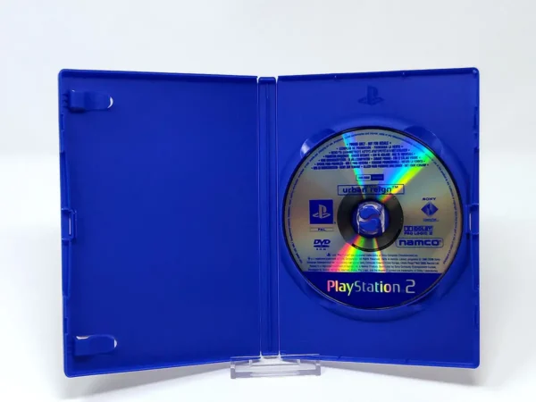 Interior del juego Urban Reign (ESP) (Promo) para PlayStation 2 con disco y manual