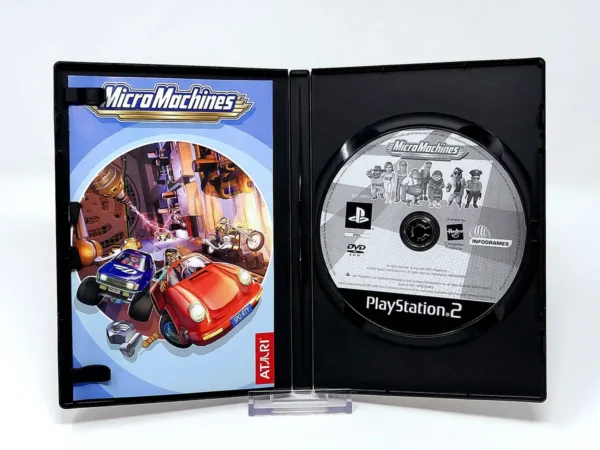 Interior del juego Micro Machines (UK) para PlayStation 2 con disco y manual