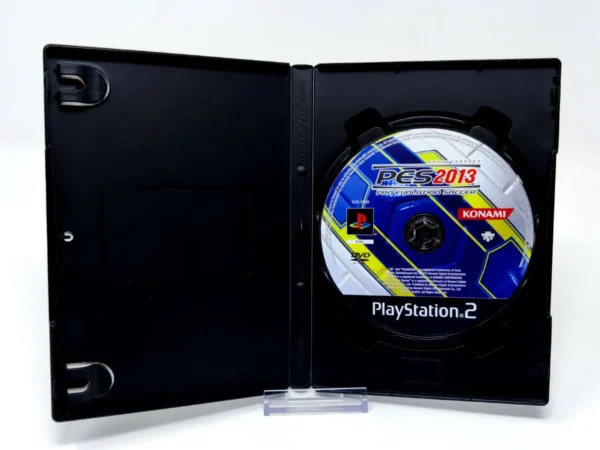Interior del juego PES 2013: Pro Evolution Soccer (ESP) (Rebajado) para PlayStation 2 con disco y manual