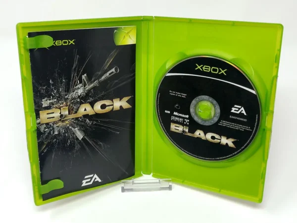 Interior del juego Black (ESP) para XBOX con disco y manual
