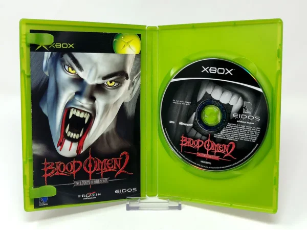Interior del juego Blood Omen 2: The Legacy of Kain Series (ESP) para XBOX con disco y manual