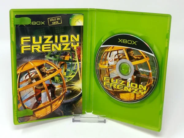 Interior del juego Fuzion Frenzy (ESP) para XBOX con disco y manual