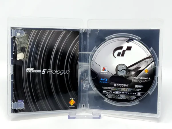 Interior del juego Gran Turismo 5: Prologue (ESP) (v2) (Rebajado) para PlayStation 2 con disco y manual