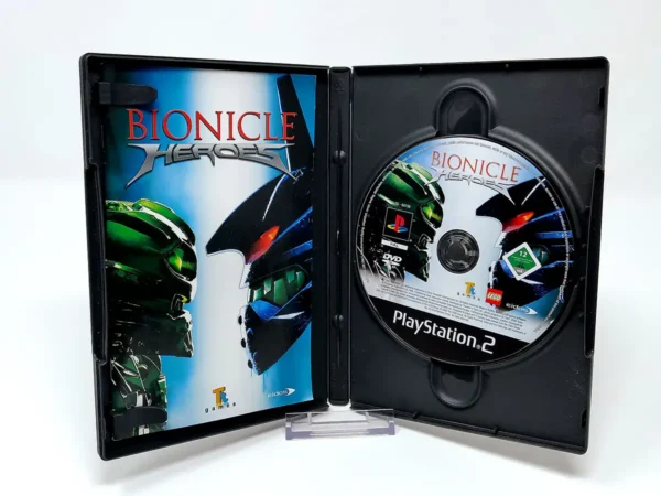 Interior del juego Bionicle Heroes (ESP) para PlayStation 2 con disco y manual