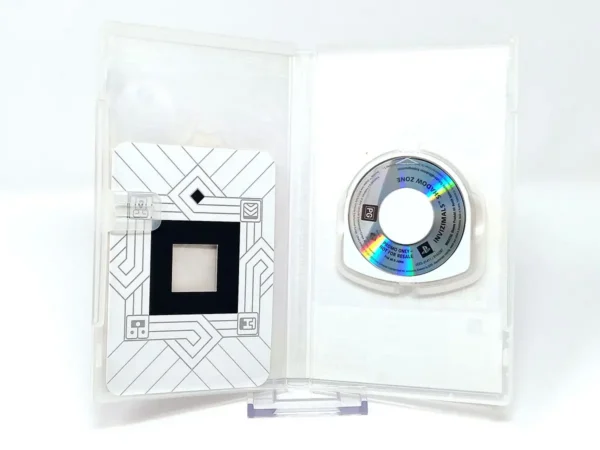 Interior del juego Invizimals: La Otra Dimensión (ESP) (Promo) para PSP con disco y manual