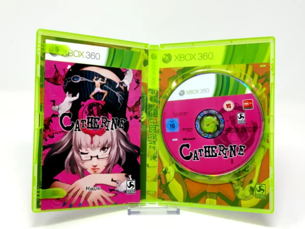 Interior del juego Catherine (ESP) para XBOX 360 con disco y manual
