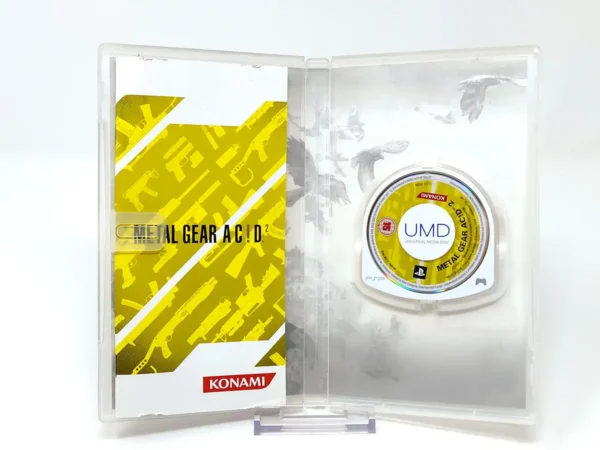 Interior del juego Metal Gear Ac!d² (ESP) para PSP con disco y manual