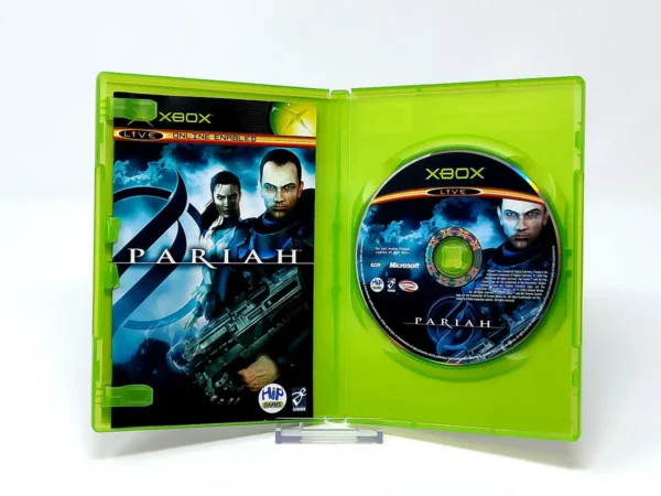 Interior del juego Pariah (ESP) para XBOX con disco y manual