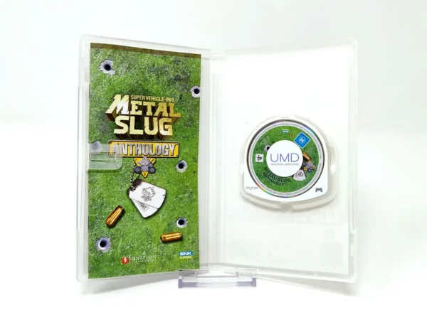 Interior del juego Metal Slug Anthology (ESP) para PSP con disco y manual