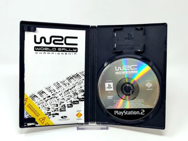 Interior del juego WRC: World Rally Championship (POR) para PlayStation 2 con disco y manual