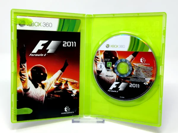 Interior del juego F1 2011 (ESP) (v2) para XBOX 360 con disco y manual