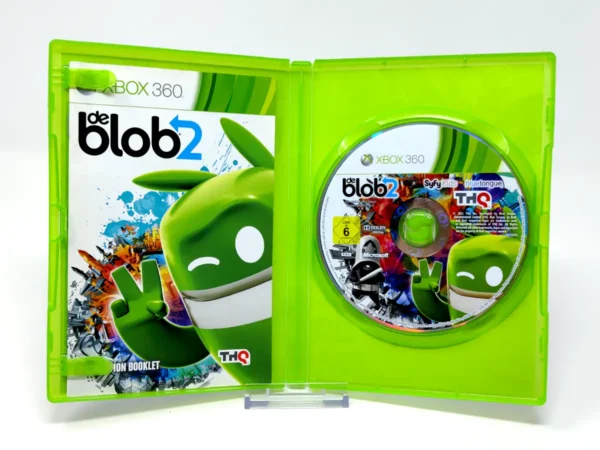 Interior del juego De Blob 2 (UK) para XBOX 360 con disco y manual