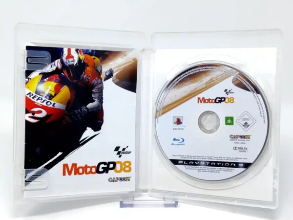 Interior del juego MotoGP 08 (ESP) para PlayStation 3 con disco y manual