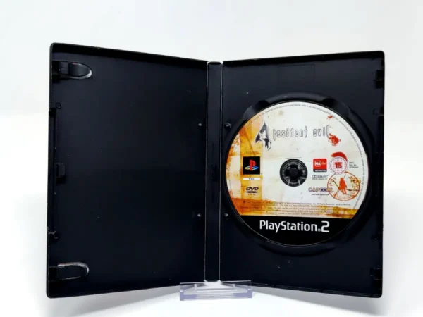 Interior del juego Resident Evil 4 (ESP) (Rebajado) para PlayStation 2 con disco y manual