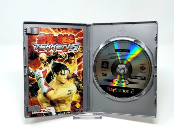Interior del juego Tekken 5 (ESP) (Platinum) para PlayStation 2 con disco y manual