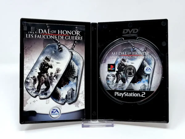 Interior del juego Medal of Honor: Les Faucons de Guerre  (FRA) para PlayStation 2 con disco y manual