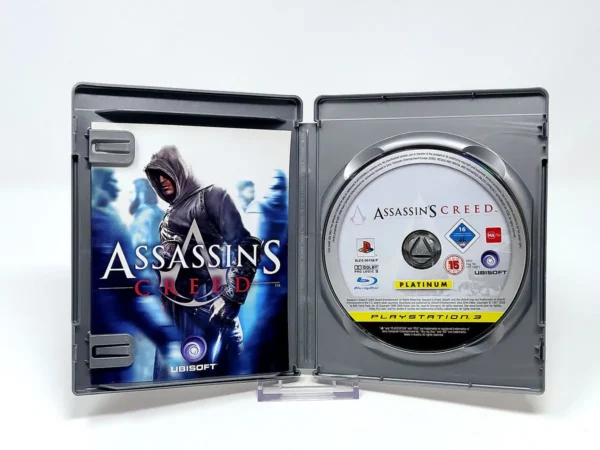 Interior del juego Assassin's Creed (ESP) (Platinum) para PlayStation 3 con disco y manual