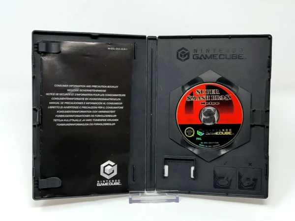 Interior del juego Super Smash Bros. Melee (UK) (Rebajado) para Nintendo GameCube con disco y manual