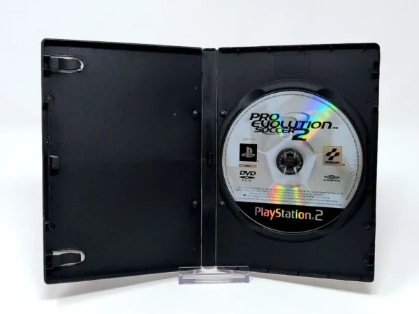 Interior del juego Pro Evolution Soccer 2 (FRA) (Rebajado) para PlayStation 2 con disco y manual