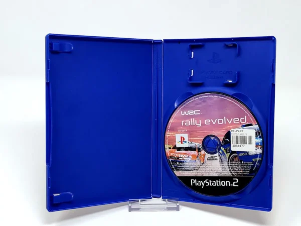 Interior del juego WRC: Rally Evolved (POR) (Rebajado) para PlayStation 2 con disco y manual