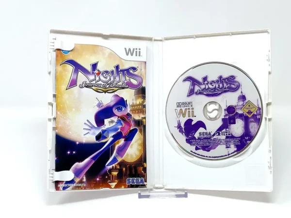 Interior del juego Nights: Journey of Dreams (UK) para Nintendo Wii con disco y manual