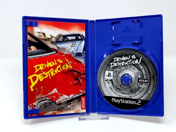 Interior del juego Driven to Destruction (ESP) para PlayStation 2 con disco y manual