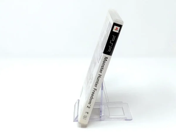 Lateral de la caja de Monster Hunter Freedom 2 (ESP) para PSP