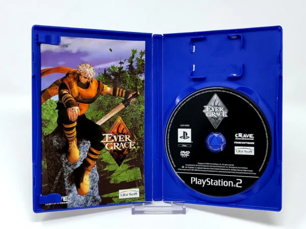 Interior del juego Evergrace para PlayStation 2 con disco y manual