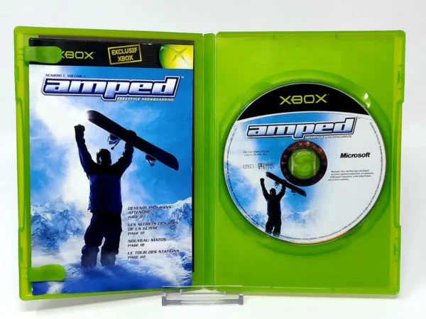 Interior del juego Amped: Freestyle Snowboarding (FRA) para XBOX con disco y manual