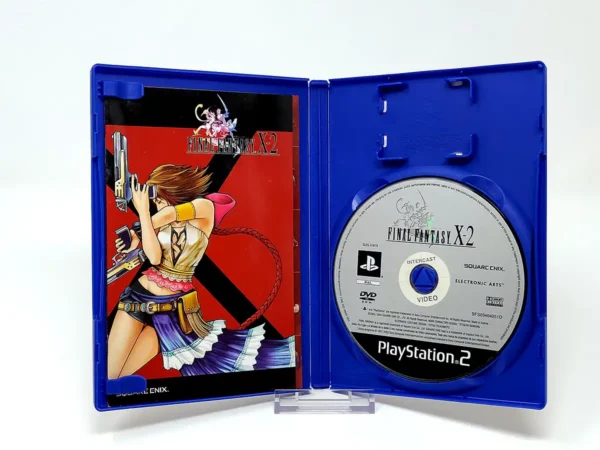 Interior del juego Final Fantasy X-2 (ESP) para PlayStation 2 con disco y manual