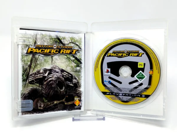 Interior del juego MotorStorm: Pacific Rift (ESP) (Essentials) para PlayStation 3 con disco y manual