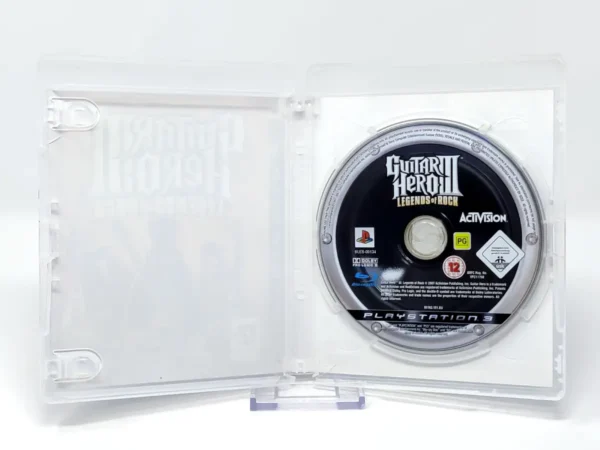 Interior del juego Guitar Hero III: Legends of Rock (ESP) (Rebajado) para PlayStation 3 con disco y manual